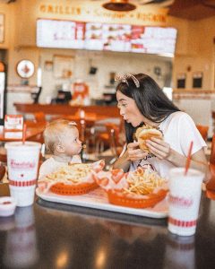 FredHeads enjoying a delicious Freddy's meal